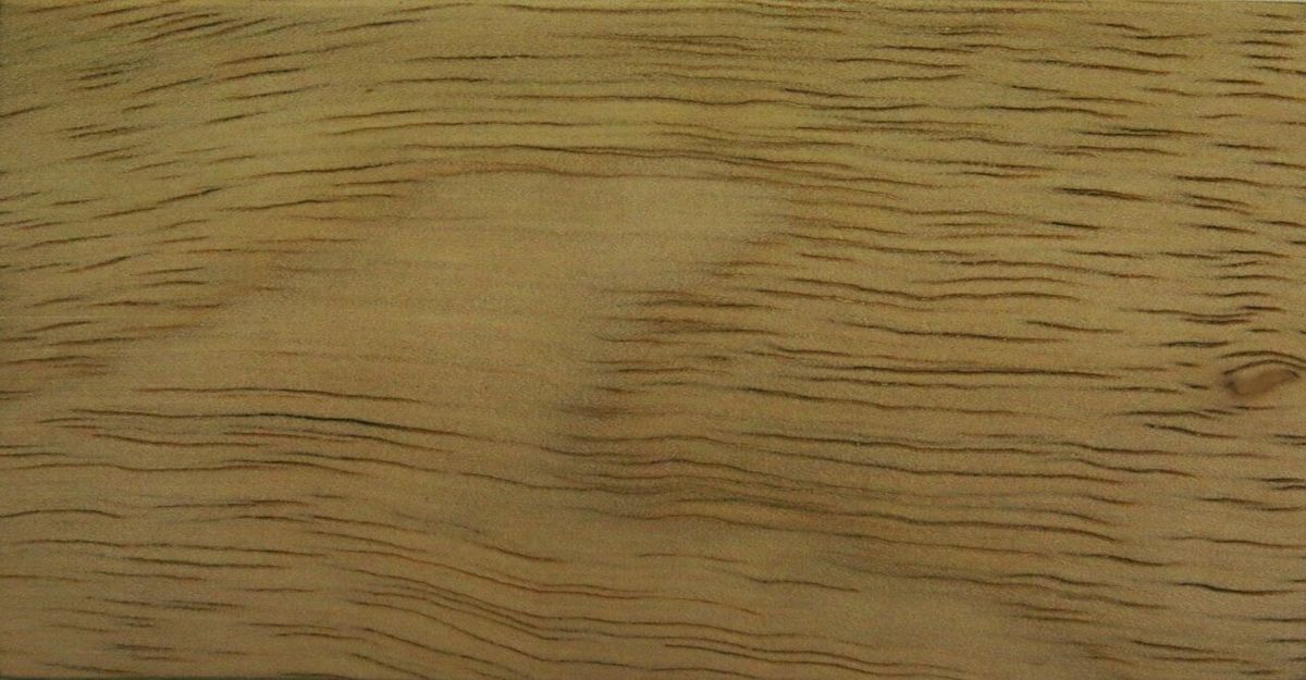 Veta clara y fibrosa de la madera de picho, muy de cerca.