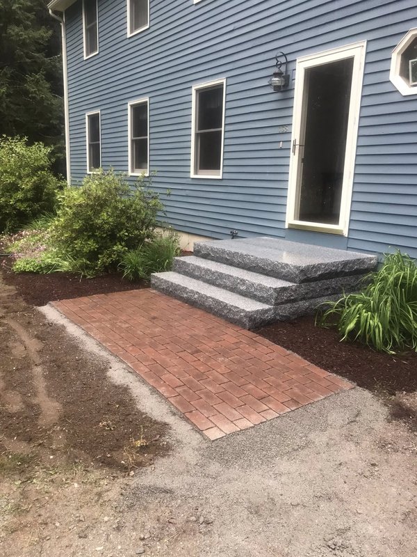 New granite steps with brick paver walkway - After