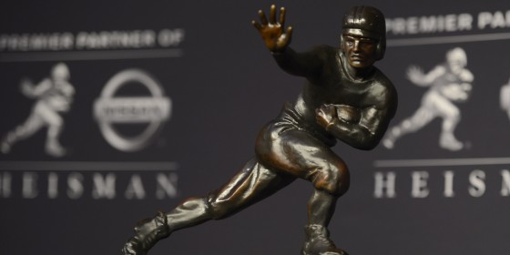 Johnny Manziel of Texas A&M had his name engraved on the Heisman Trophy after becoming the first freshman to win the award, Saturday, Dec. 8, 2012 in New York. (AP Photo/Henny Ray Abrams)