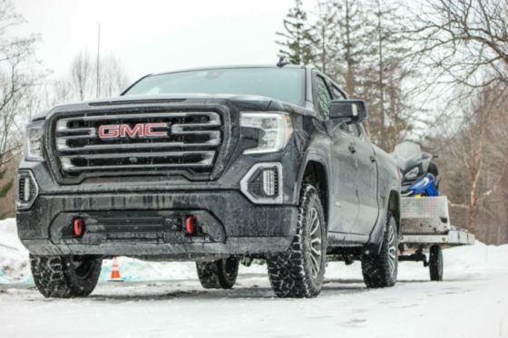 2019 GMC Sierra Denali Towing Snowmobiles in Vermont