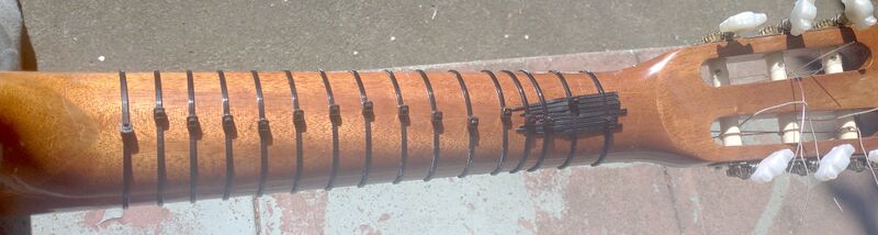 File:Cable-tie frets.jpg